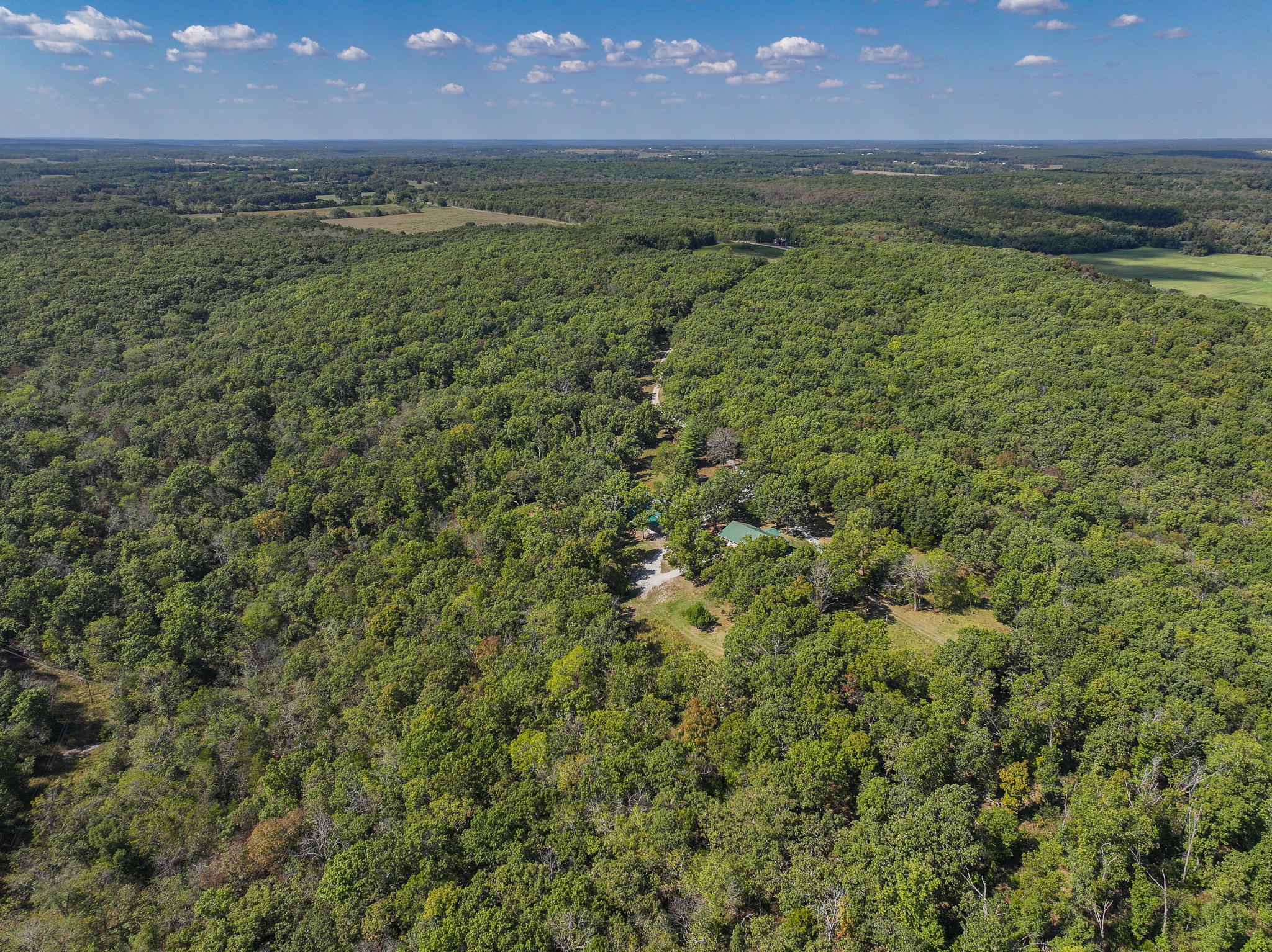 Home on 109+\- acres in Collins MO