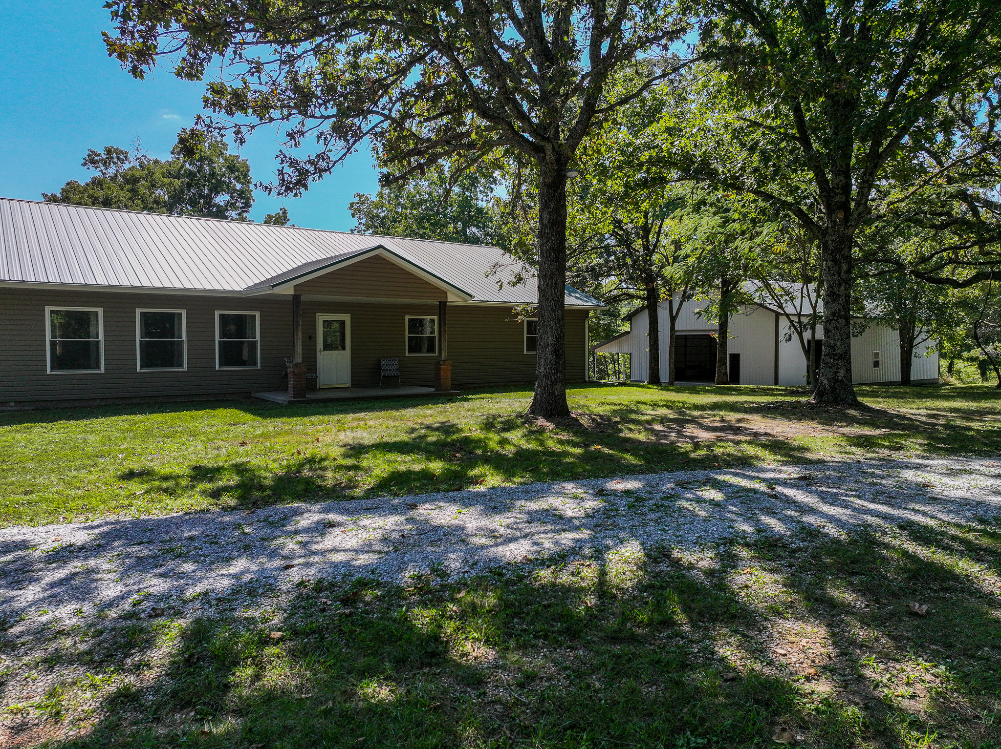 Home on 109+\- acres in Collins MO