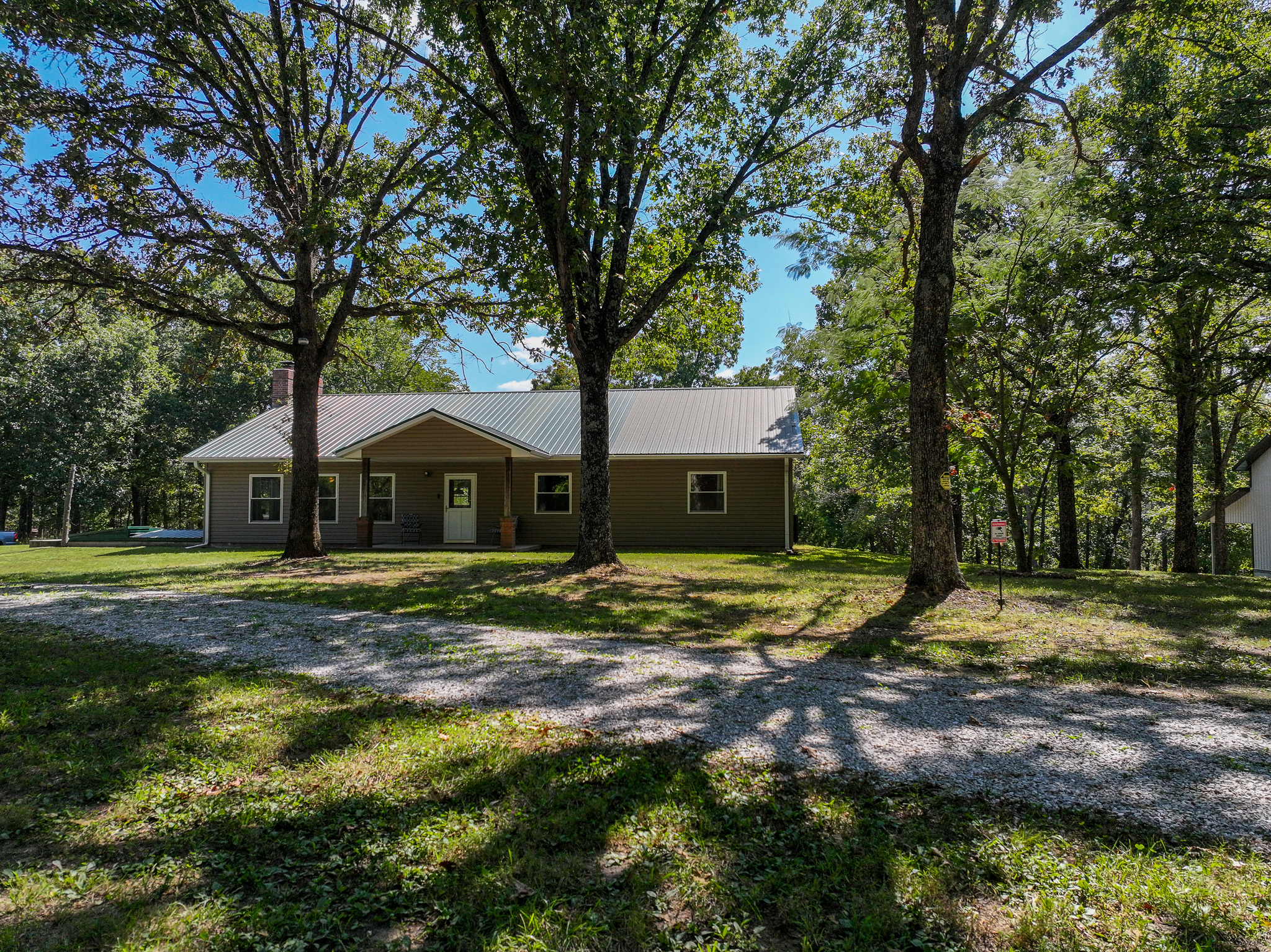 Home on 109+\- acres in Collins MO