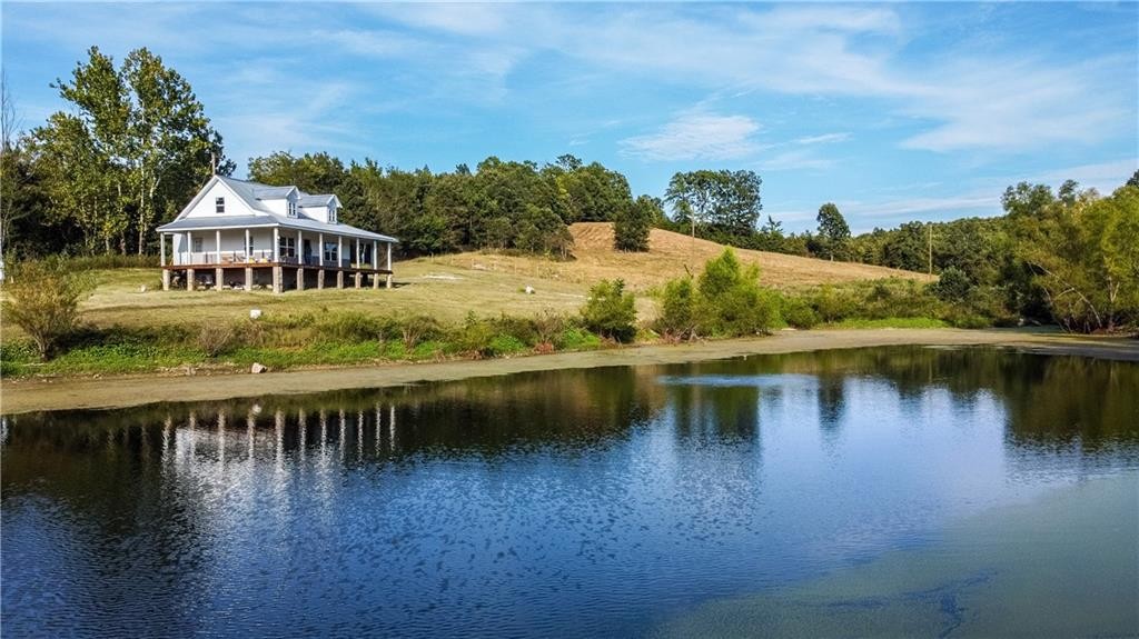 Ozark Mountain Home Hunting Retreat with Spring Fed Ponds For Sale in Searcy Co, Arkansas