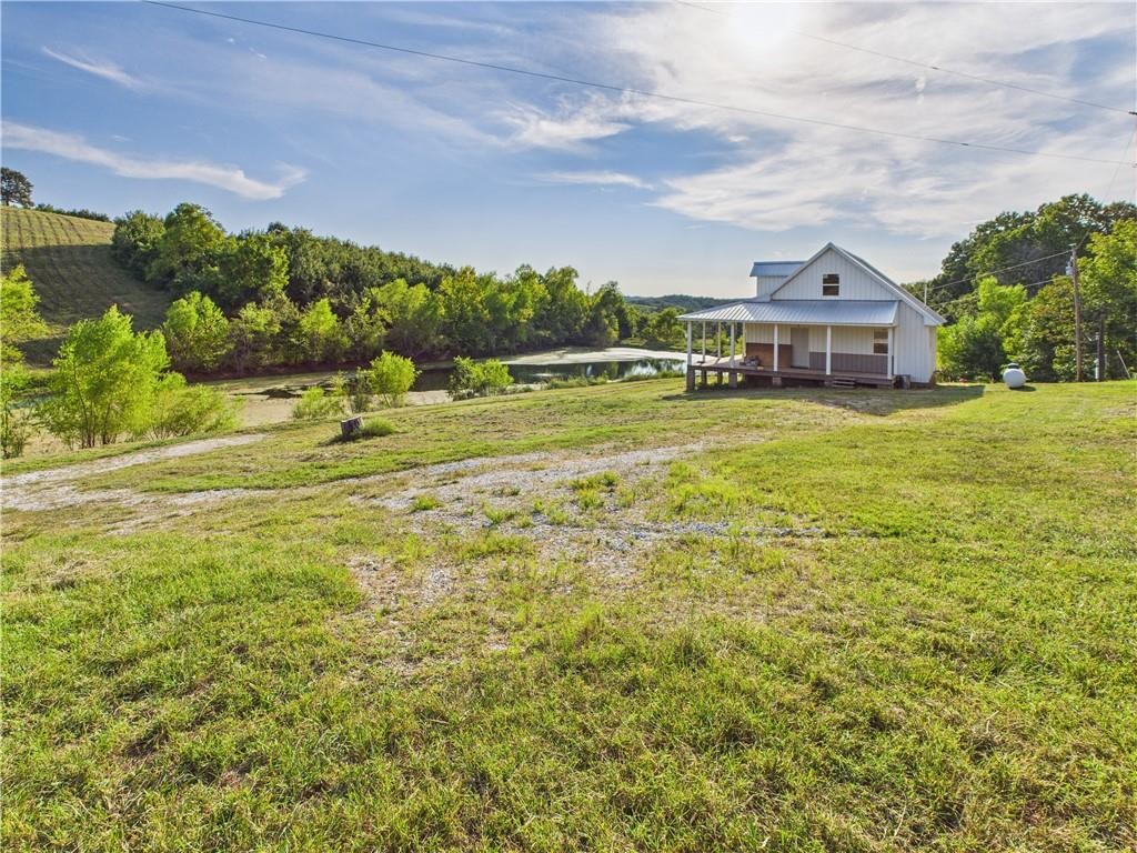 Ozark Mountain Home Hunting Retreat with Spring Fed Ponds For Sale in Searcy Co, Arkansas