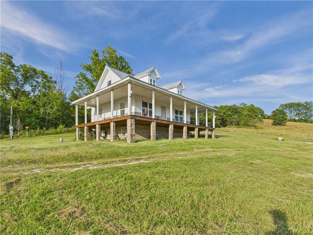 Ozark Mountain Home Hunting Retreat with Spring Fed Ponds For Sale in Searcy Co, Arkansas