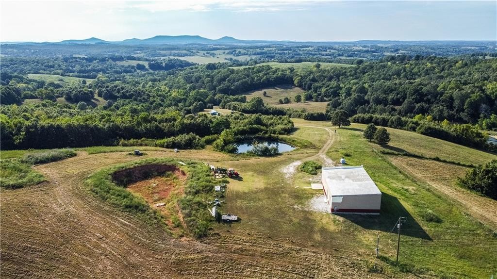 Ozark Mountain Home Hunting Retreat with Spring Fed Ponds For Sale in Searcy Co, Arkansas