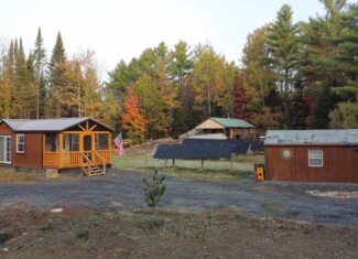 Off-Grid Maine Homestead with Dual Cabins, Solar Power & 49± Acres