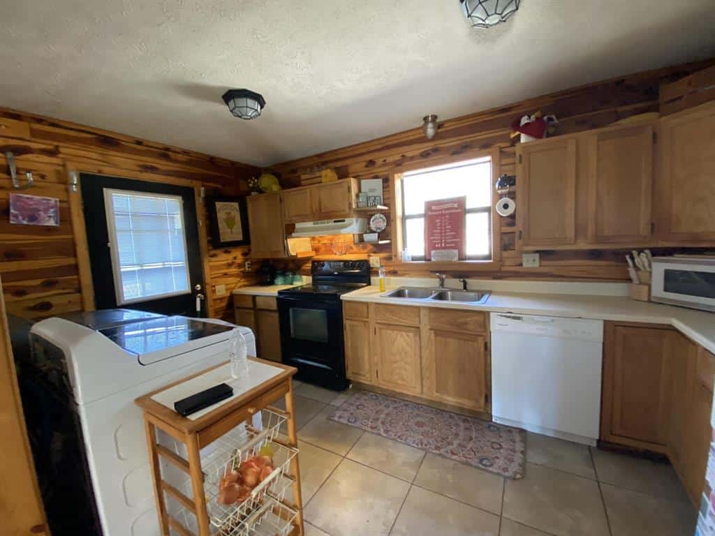 Large Acreage Property With Multiple Cabins For Sale In Ozarks