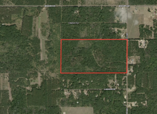 Escape to 80 acres of heavily timbered ground in Adams County