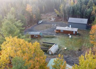 Off-Grid Maine Homestead with Dual Cabins, Solar Power & 49± Acres