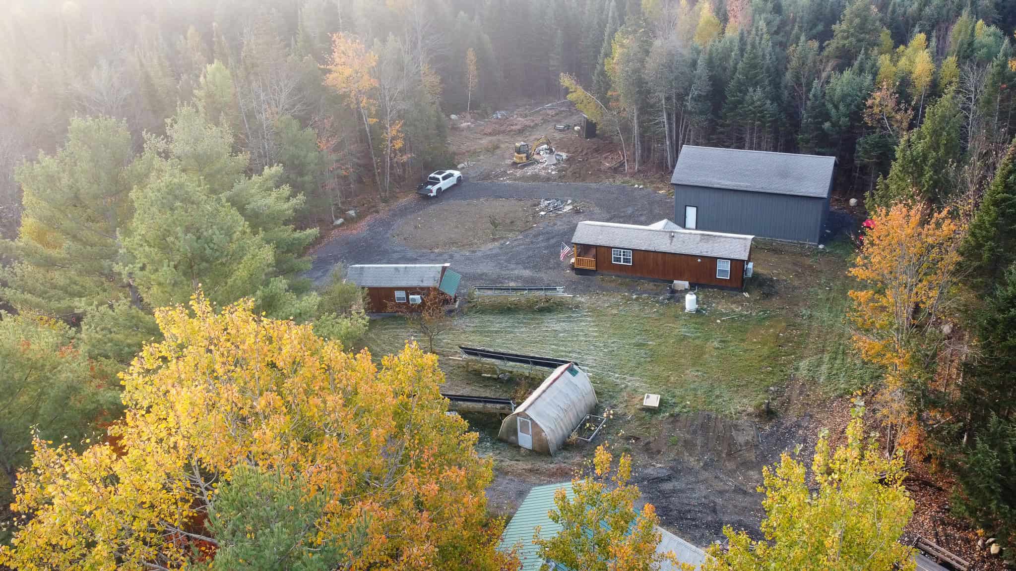Off-Grid Maine Homestead with Dual Cabins, Solar Power & 49± Acres