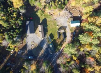 Off-Grid Maine Homestead with Dual Cabins, Solar Power & 49± Acres