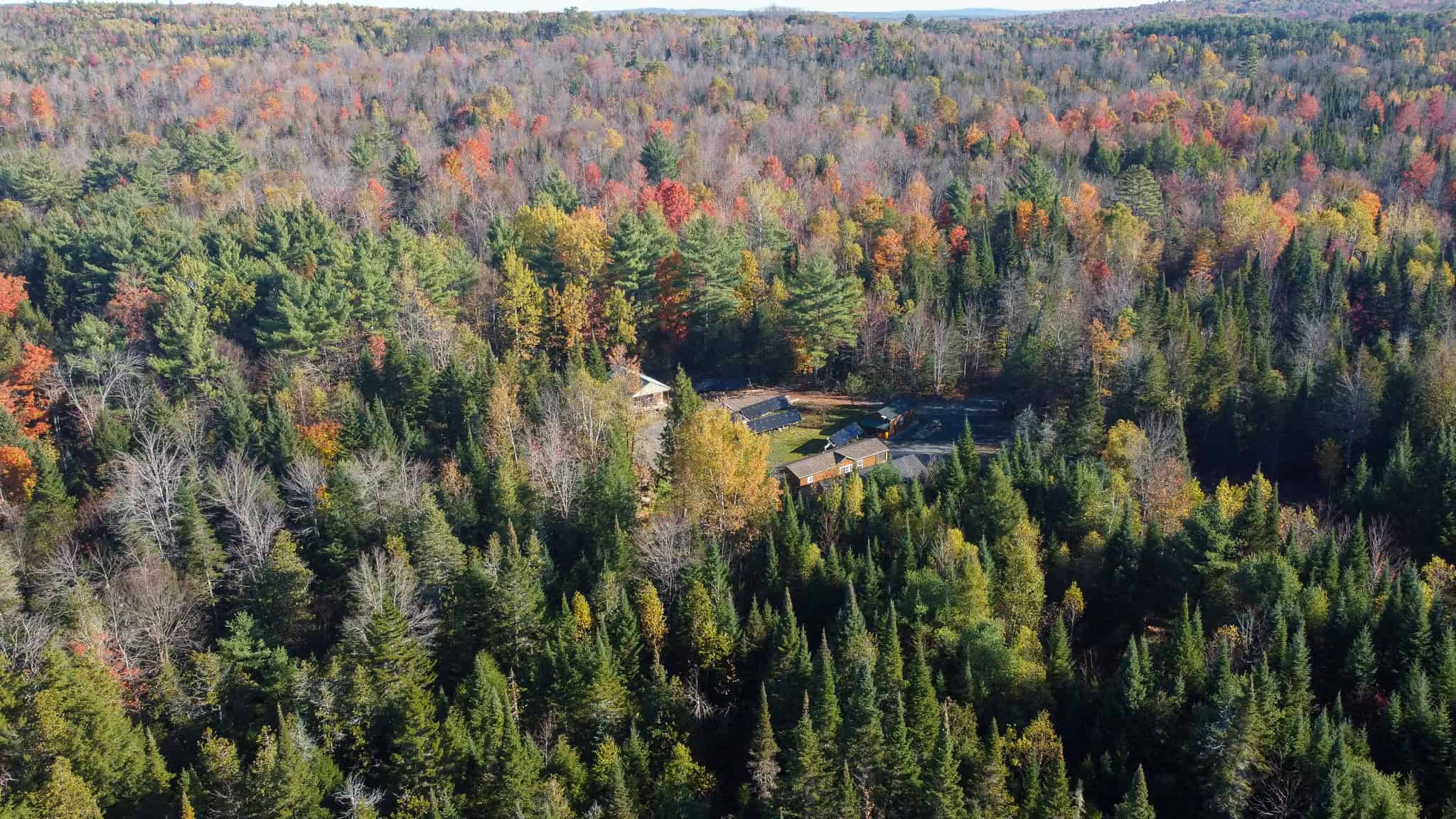 Off-Grid Maine Homestead with Dual Cabins, Solar Power & 49± Acres