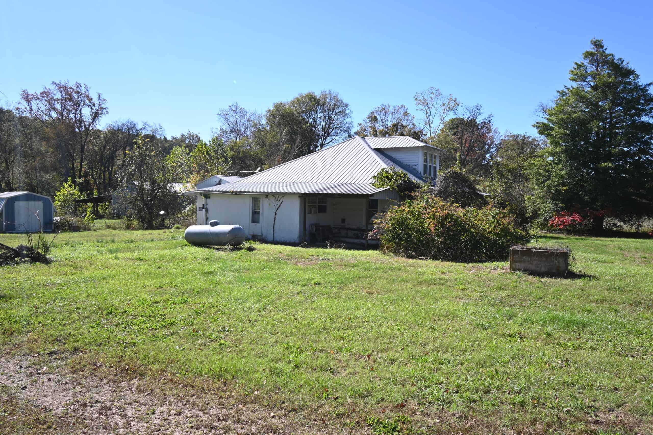 Hunting Land With Vintage Farm For Sale in Linden, Tennessee