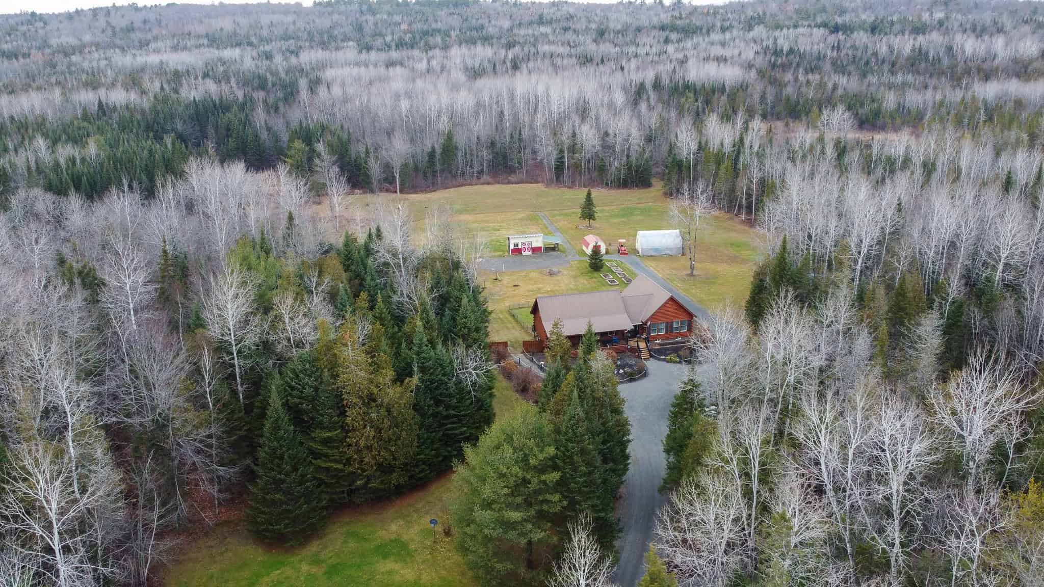 2,000 Sq. Ft. Log Home on 48 Acres  – Milo, Maine