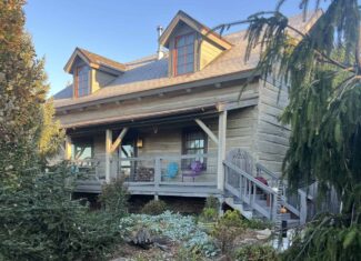 One of a Kind Lucas County, IA Acreage with Custom Log Home