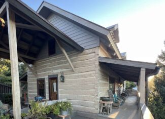 One of a Kind Lucas County, IA Acreage with Custom Log Home