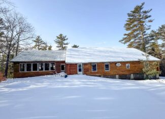 Waterfront Log Cabin on 16 Acres in Northern Maine