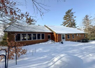 Waterfront Log Cabin on 16 Acres in Northern Maine