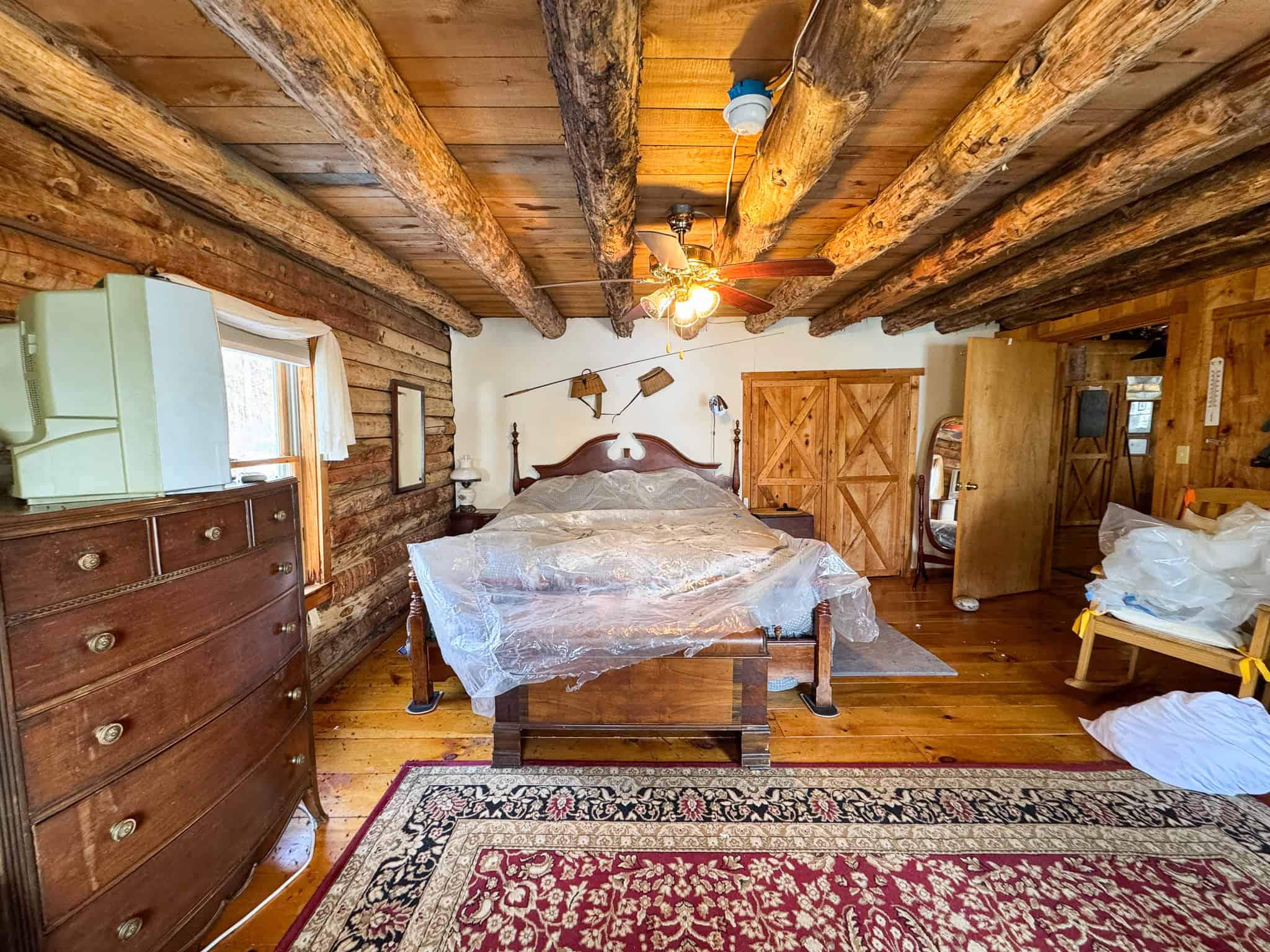 Waterfront Log Cabin on 16 Acres in Northern Maine