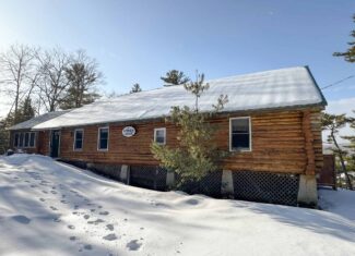Waterfront Log Cabin on 16 Acres in Northern Maine