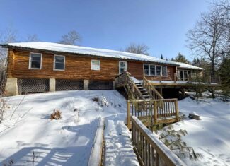 Waterfront Log Cabin on 16 Acres in Northern Maine