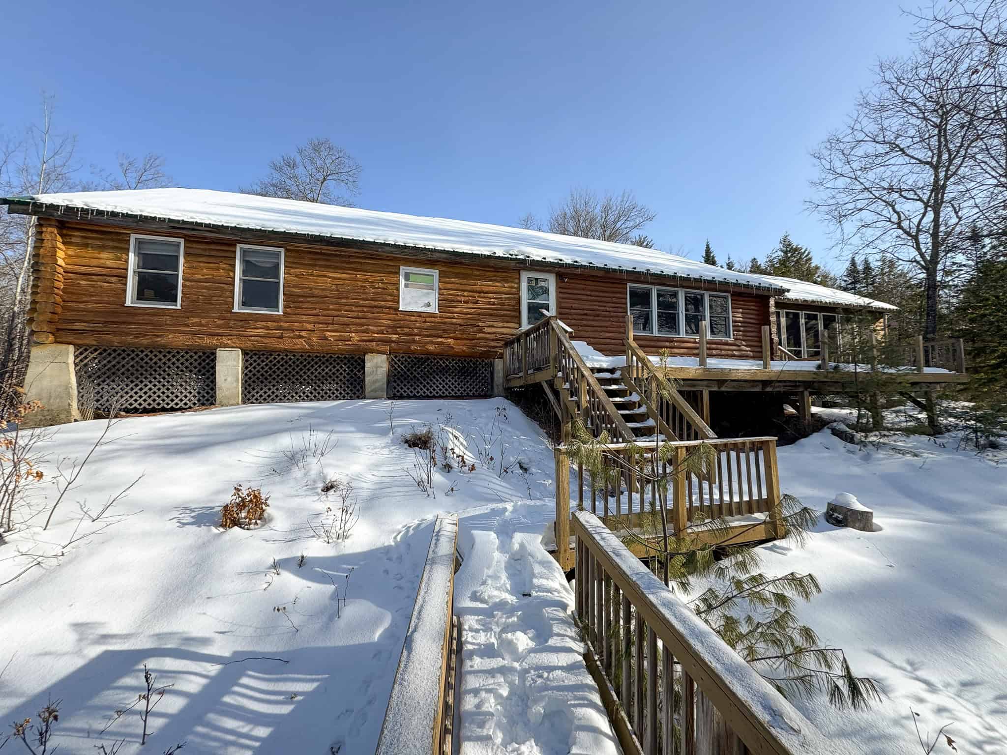 Waterfront Log Cabin on 16 Acres in Northern Maine