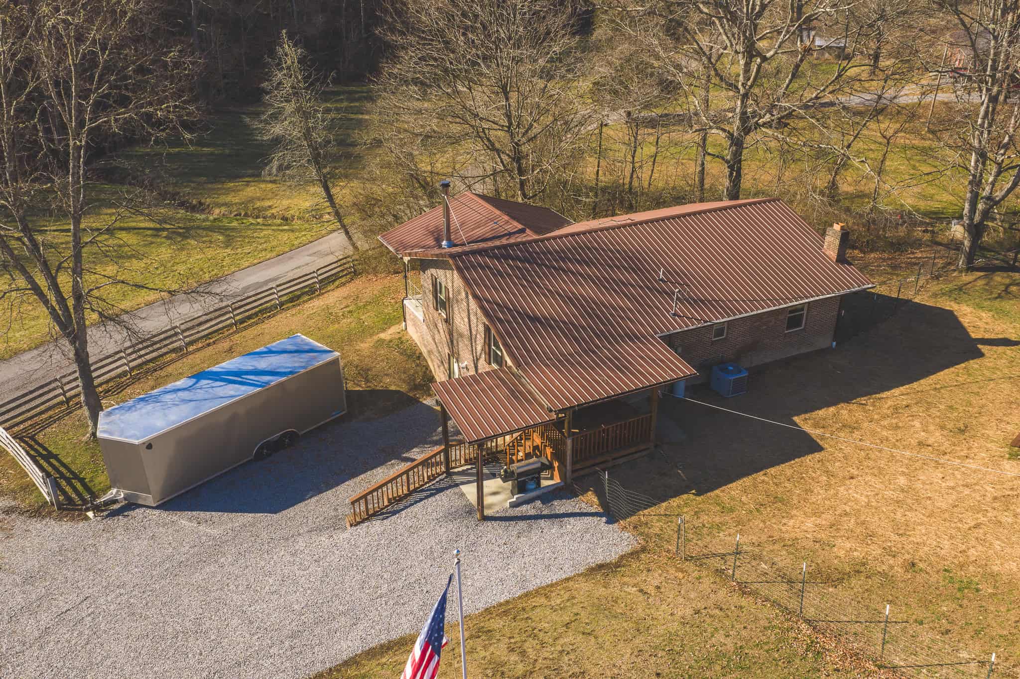 Freedom, Income Potential, and a Turnkey Farmstead: Exceptionally Clean Brick Ranch on 59+ Unrestricted Acres in Claiborne County, Tennessee