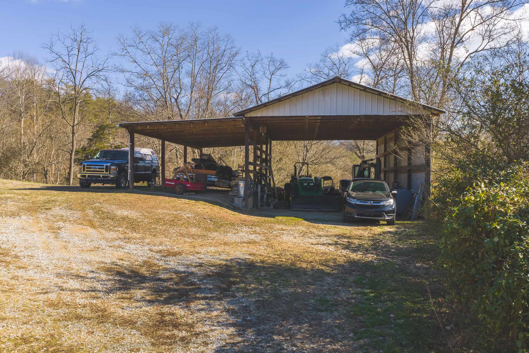 Freedom, Income Potential, and a Turnkey Farmstead: Exceptionally Clean Brick Ranch on 59+ Unrestricted Acres in Claiborne County, Tennessee