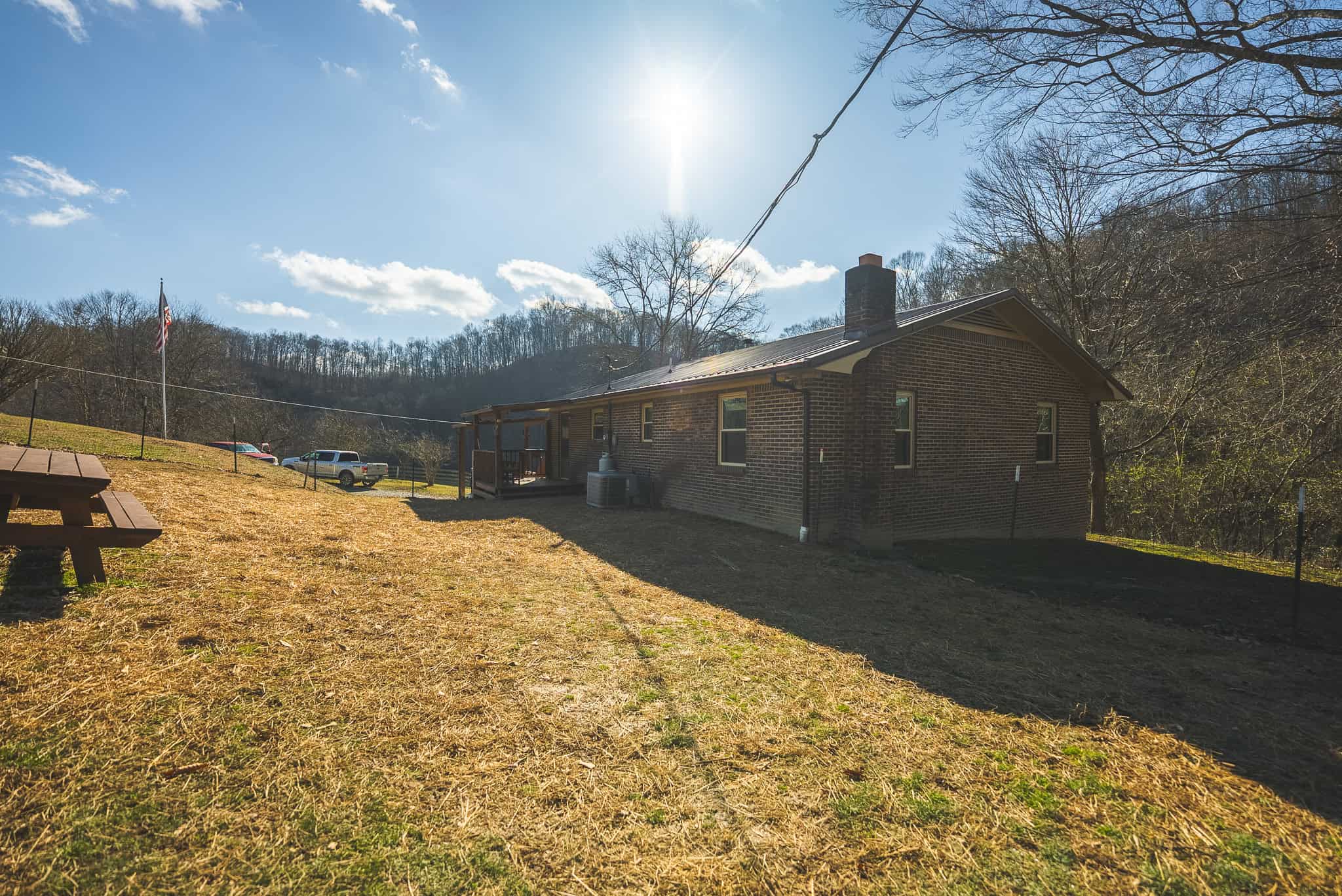 Freedom, Income Potential, and a Turnkey Farmstead: Exceptionally Clean Brick Ranch on 59+ Unrestricted Acres in Claiborne County, Tennessee