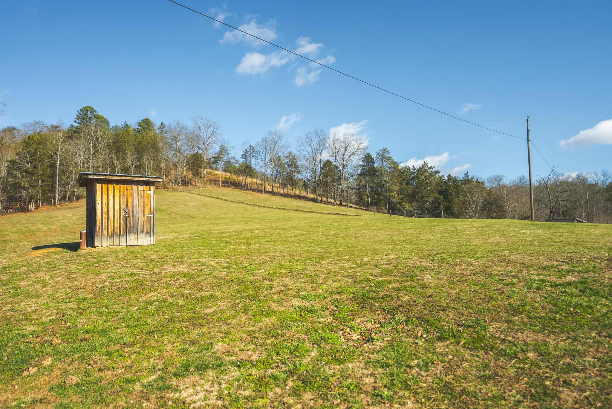 Freedom, Income Potential, and a Turnkey Farmstead: Exceptionally Clean Brick Ranch on 59+ Unrestricted Acres in Claiborne County, Tennessee