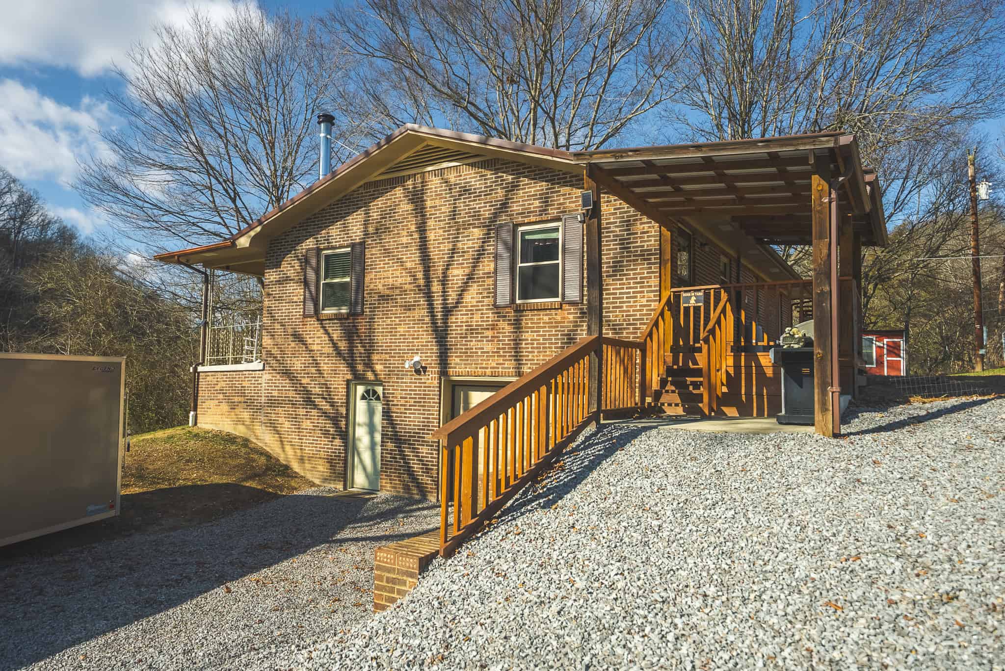 Freedom, Income Potential, and a Turnkey Farmstead: Exceptionally Clean Brick Ranch on 59+ Unrestricted Acres in Claiborne County, Tennessee