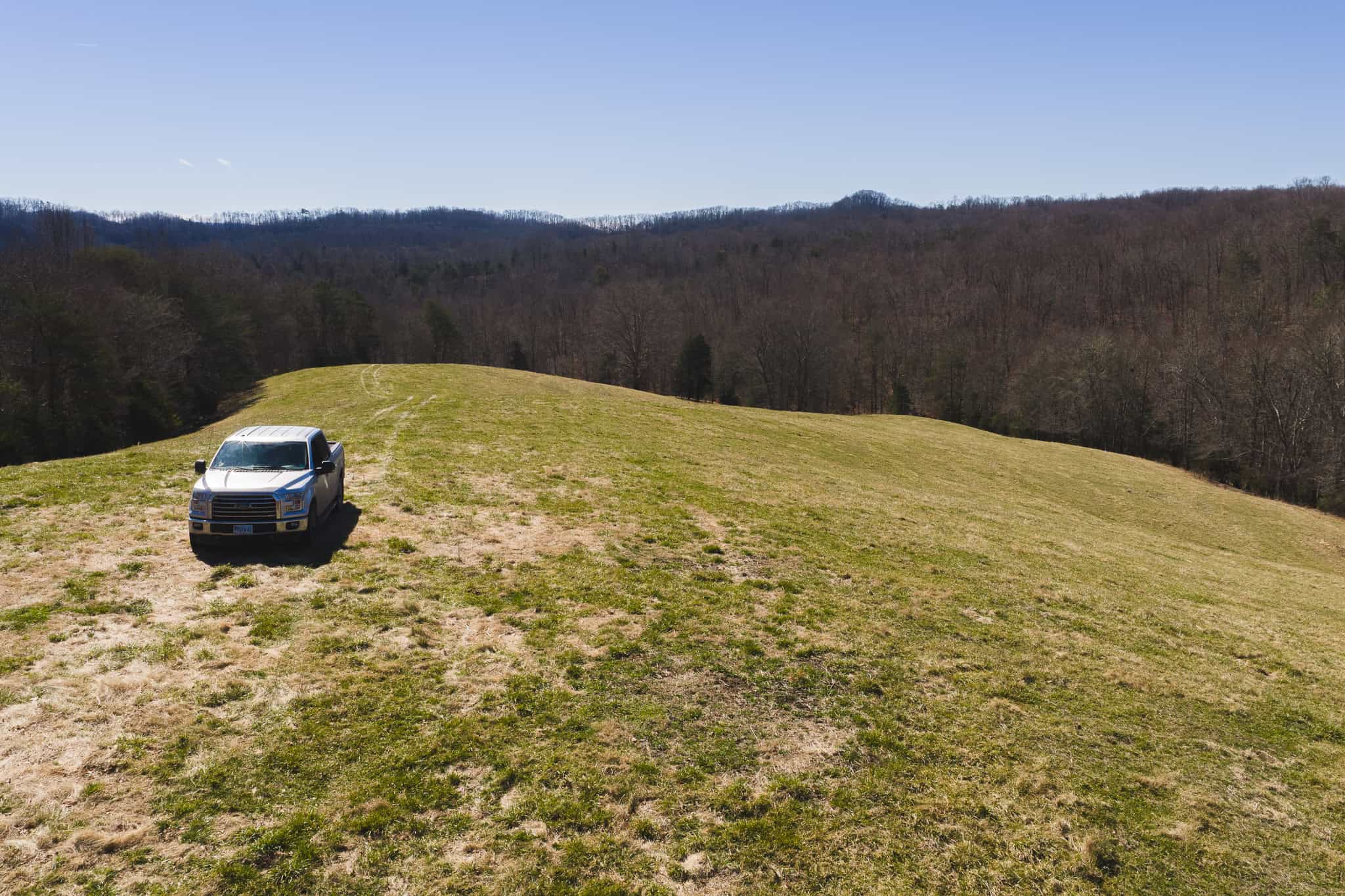 102.62 Unrestricted Acres with Farmhouse, Barn, Pond, Pasture, Timber, and East Tennessee Mountain Views in Hancock County