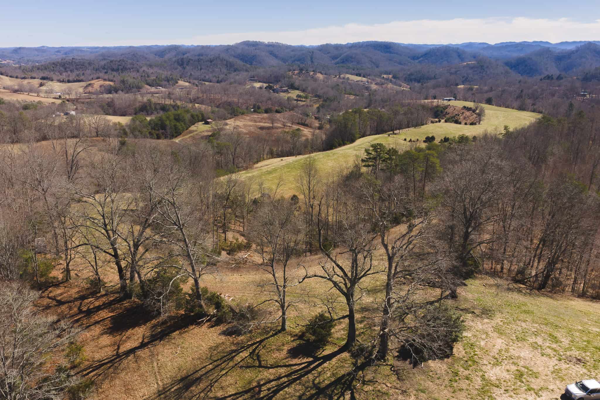 102.62 Unrestricted Acres with Farmhouse, Barn, Pond, Pasture, Timber, and East Tennessee Mountain Views in Hancock County