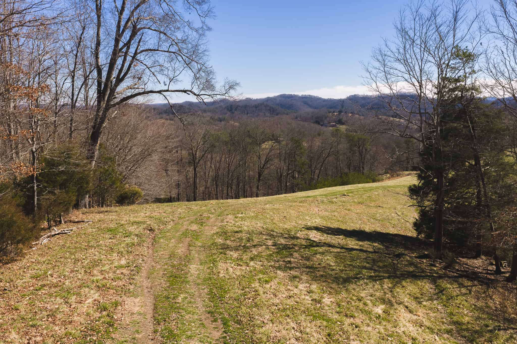 102.62 Unrestricted Acres with Farmhouse, Barn, Pond, Pasture, Timber, and East Tennessee Mountain Views in Hancock County