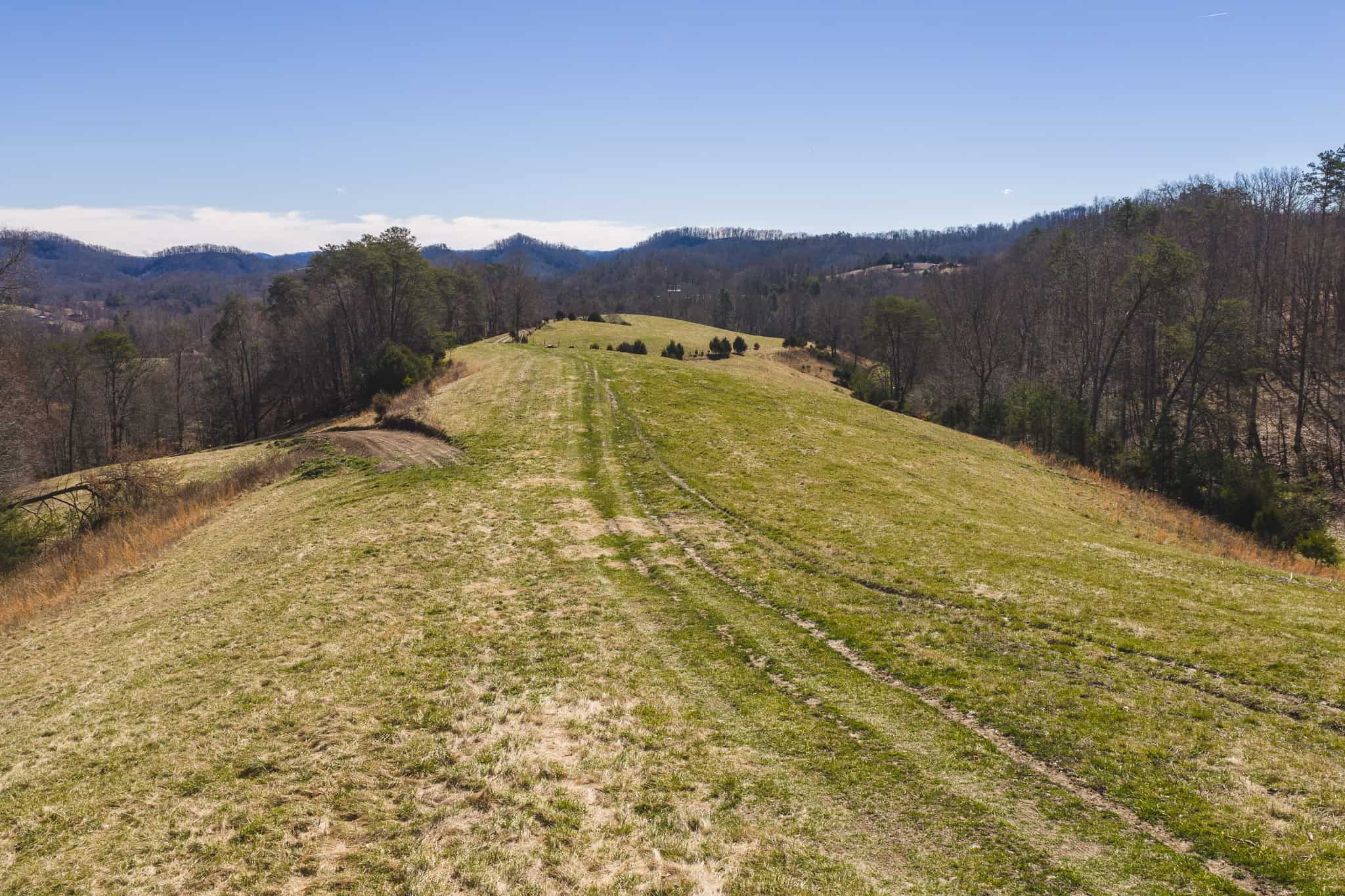 102.62 Unrestricted Acres with Farmhouse, Barn, Pond, Pasture, Timber, and East Tennessee Mountain Views in Hancock County