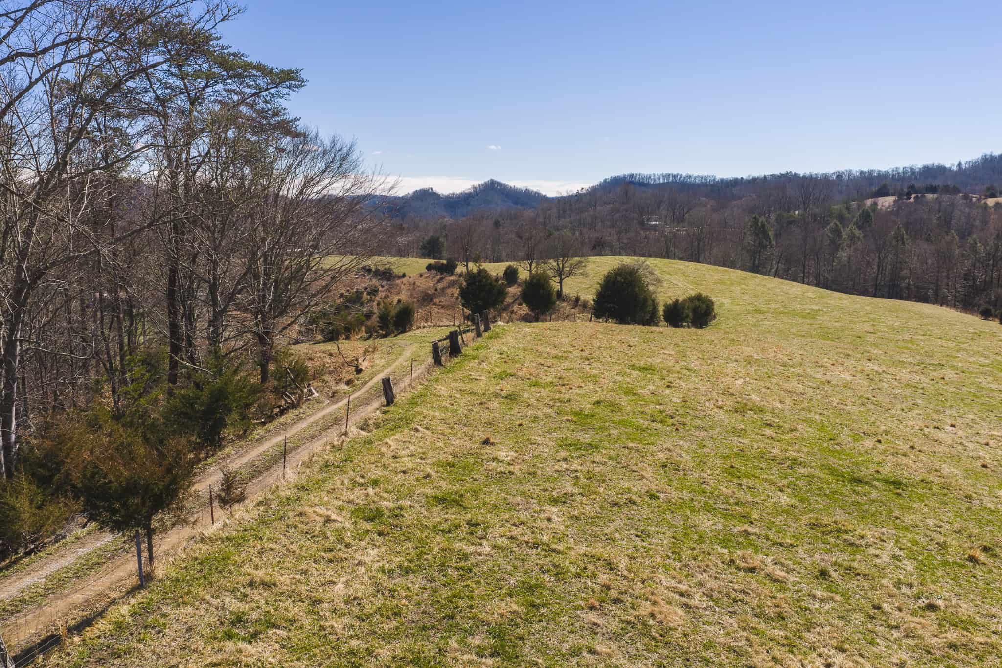 102.62 Unrestricted Acres with Farmhouse, Barn, Pond, Pasture, Timber, and East Tennessee Mountain Views in Hancock County