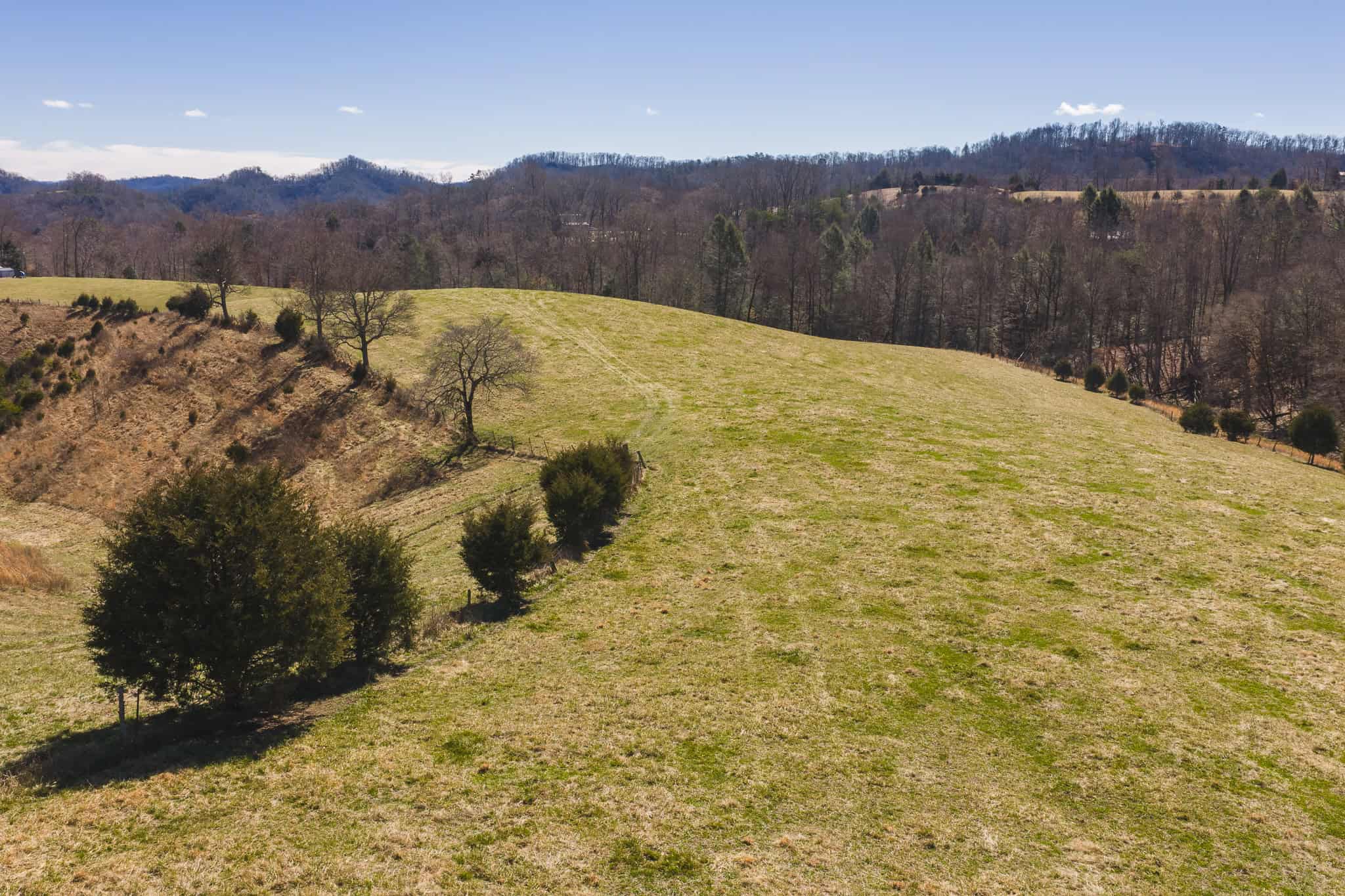 102.62 Unrestricted Acres with Farmhouse, Barn, Pond, Pasture, Timber, and East Tennessee Mountain Views in Hancock County
