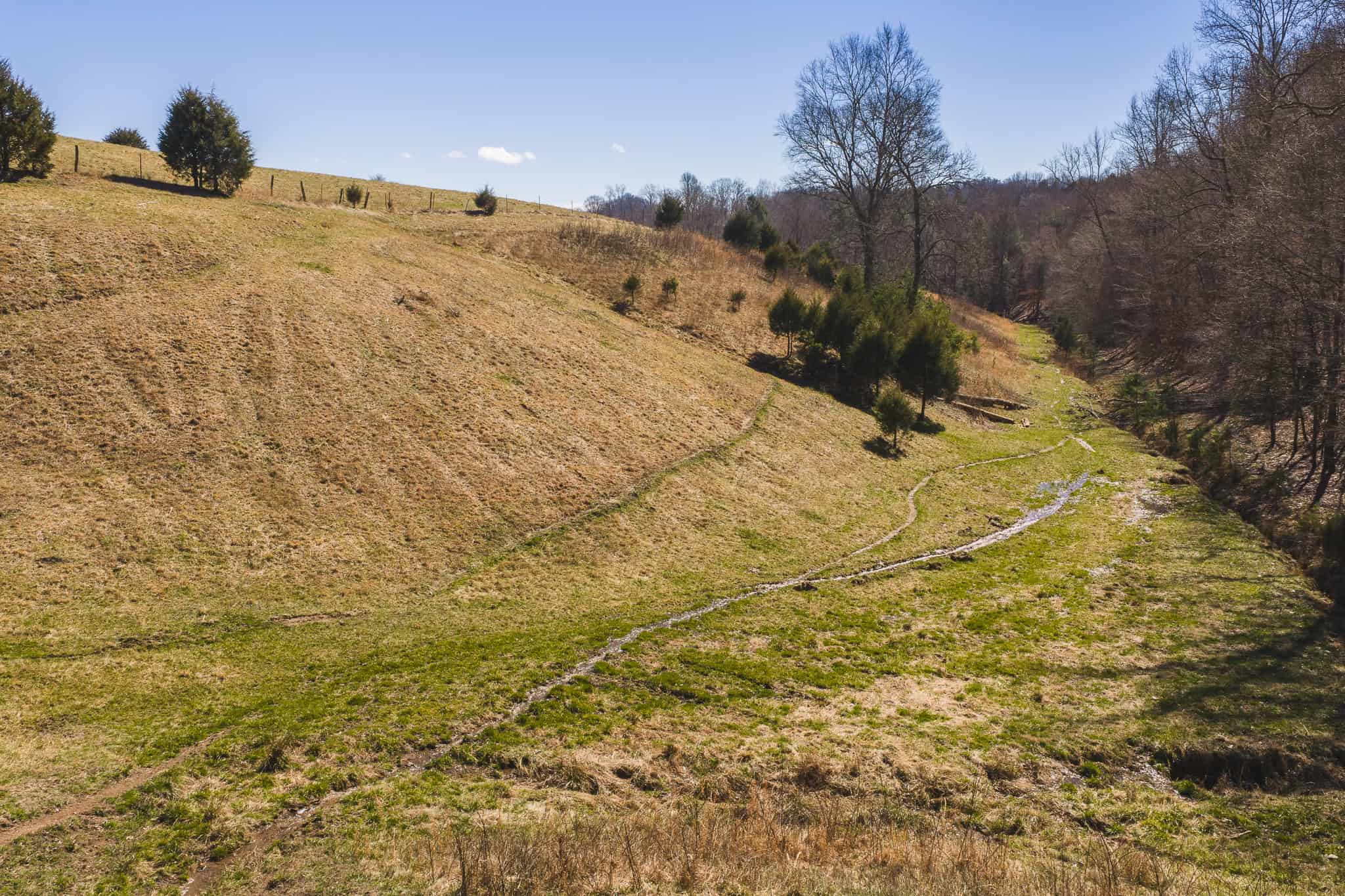 102.62 Unrestricted Acres with Farmhouse, Barn, Pond, Pasture, Timber, and East Tennessee Mountain Views in Hancock County