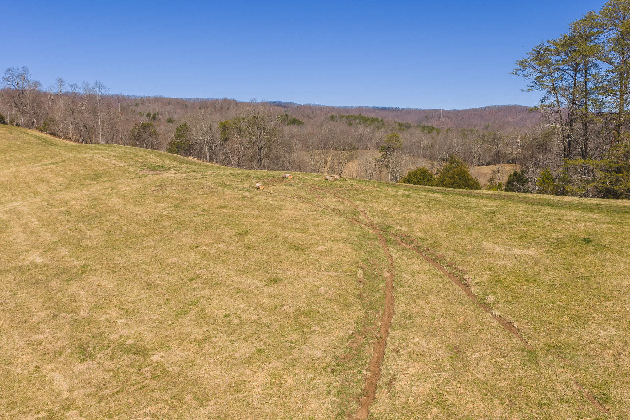 102.62 Unrestricted Acres with Farmhouse, Barn, Pond, Pasture, Timber, and East Tennessee Mountain Views in Hancock County