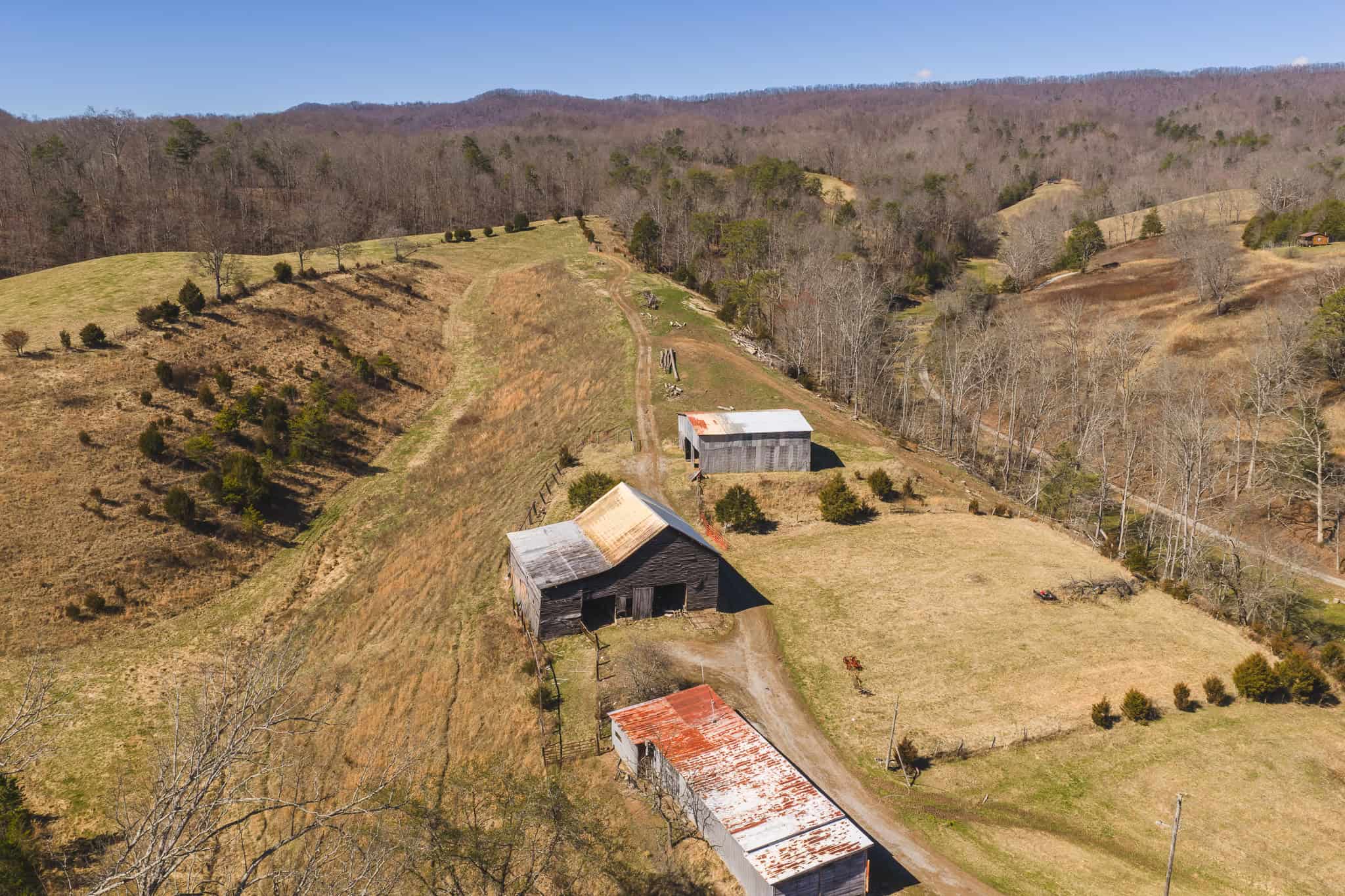 102.62 Unrestricted Acres with Farmhouse, Barn, Pond, Pasture, Timber, and East Tennessee Mountain Views in Hancock County