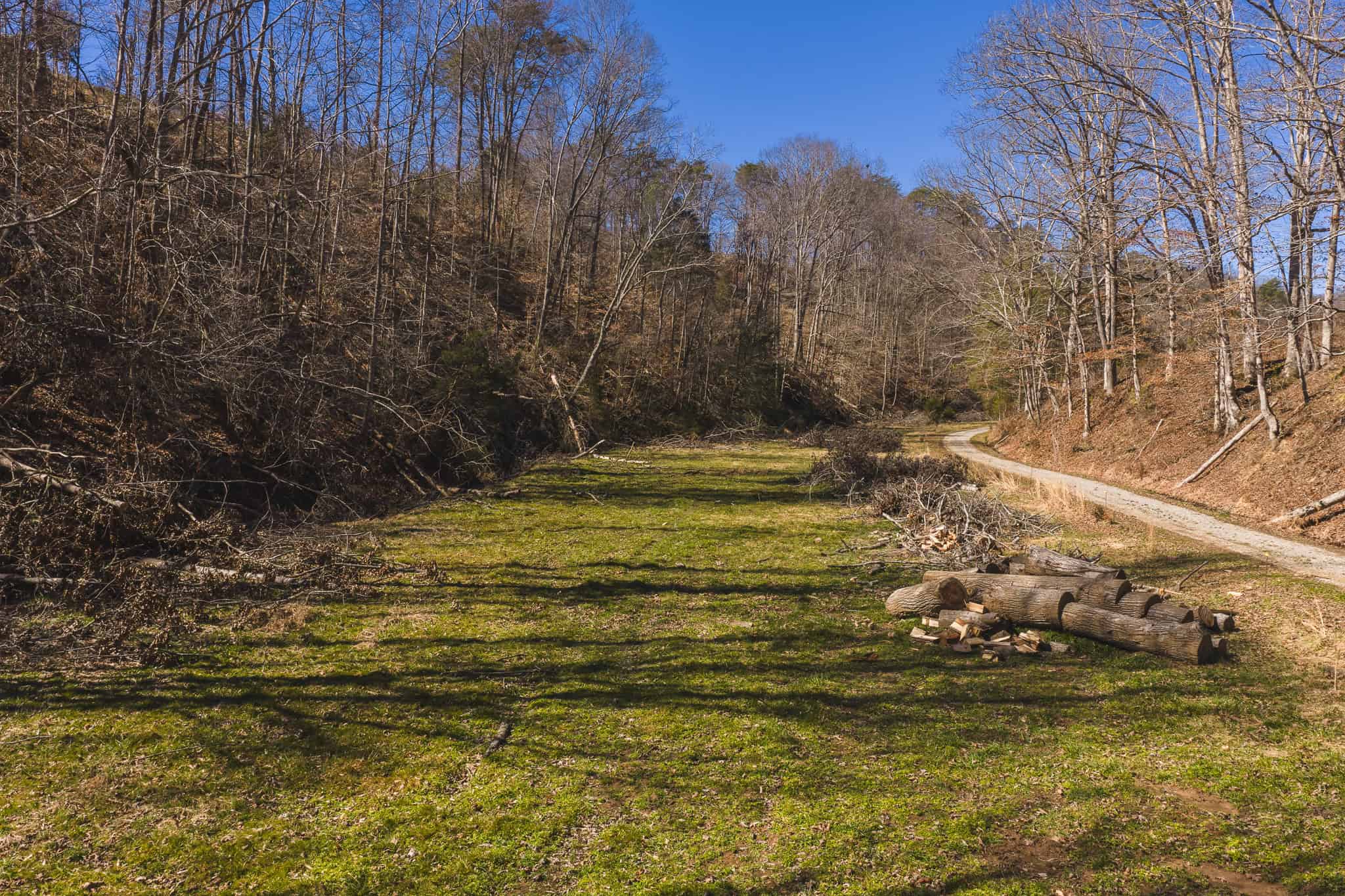 102.62 Unrestricted Acres with Farmhouse, Barn, Pond, Pasture, Timber, and East Tennessee Mountain Views in Hancock County