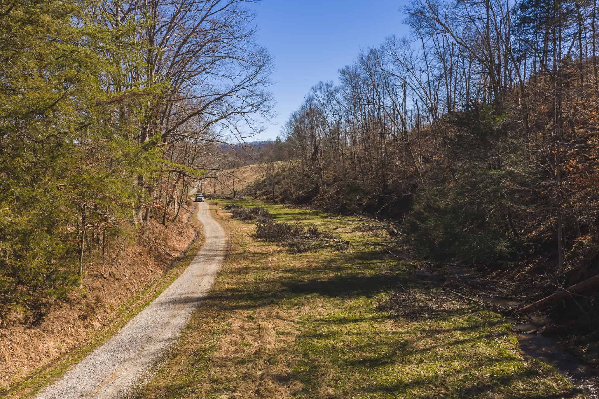 102.62 Unrestricted Acres with Farmhouse, Barn, Pond, Pasture, Timber, and East Tennessee Mountain Views in Hancock County