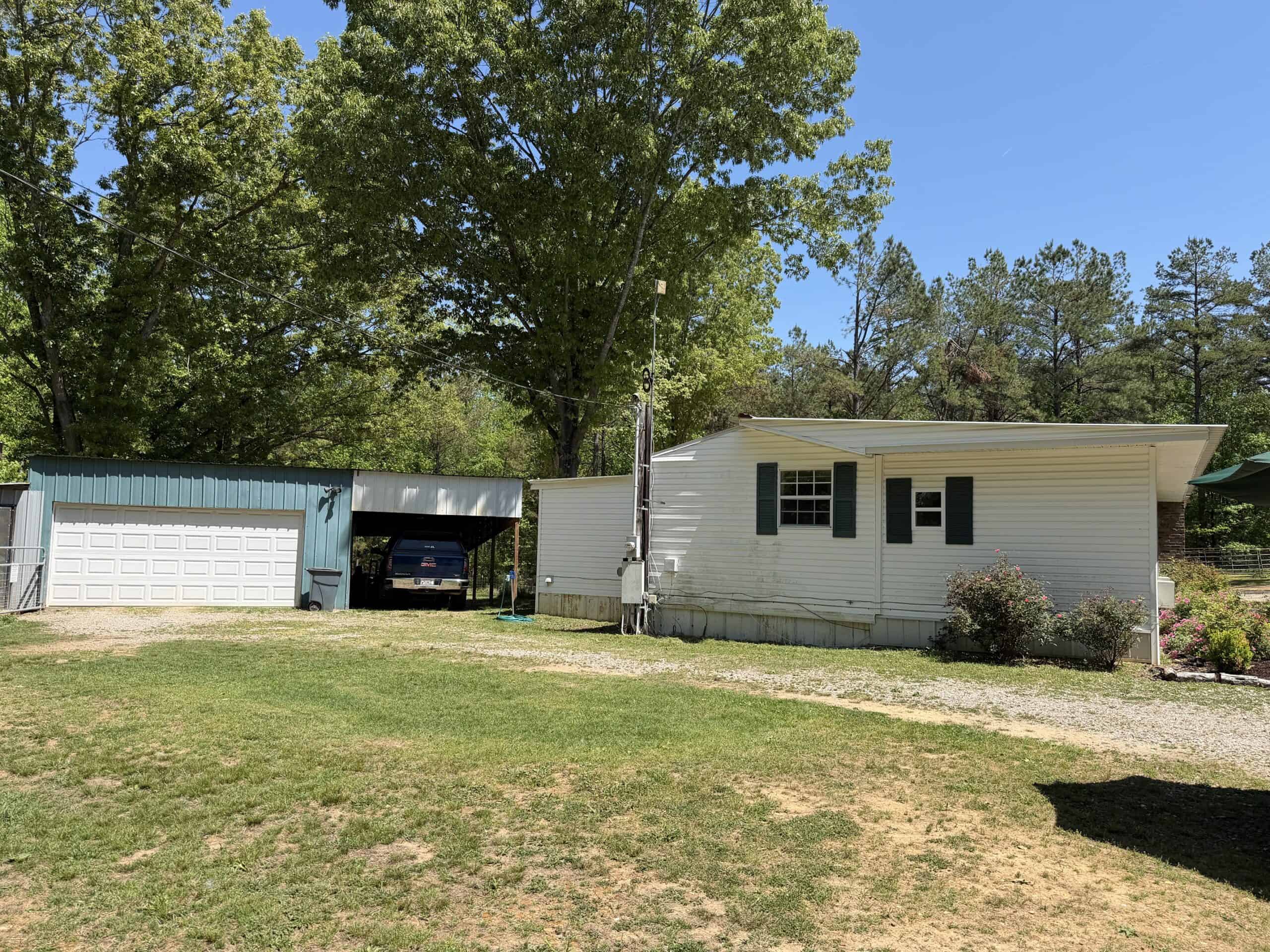 Hobby Farm for sale in TN, 44.81, Mostly Wooded, Creek, Fenced Pastures, Shop, Barn, and Great Deer & Turkey Hunting Land!