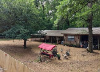 23 Acres of Riverfront Property with Sand Bar and Cabins