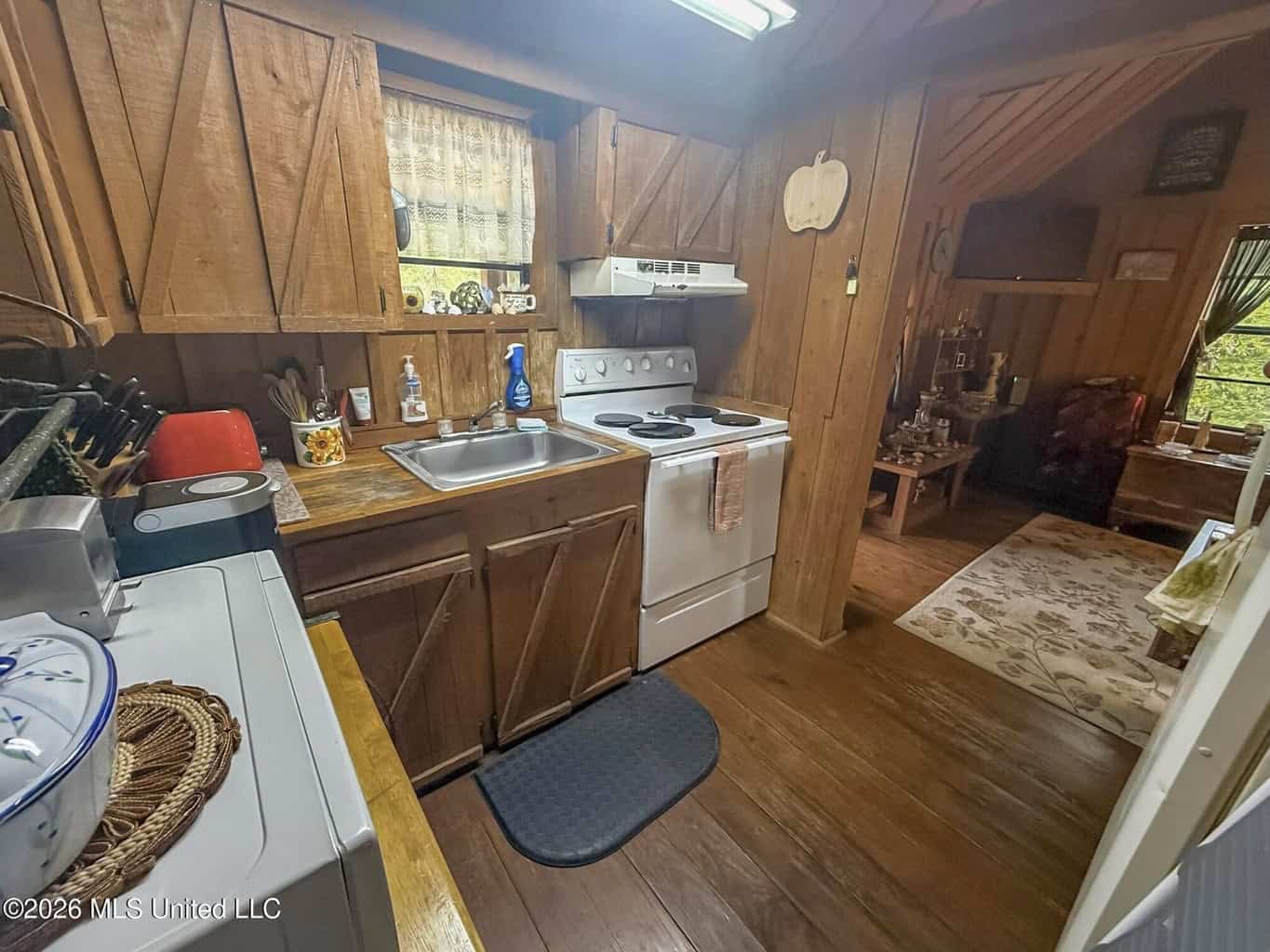 23 Acres of Riverfront Property with Sand Bar and Cabins