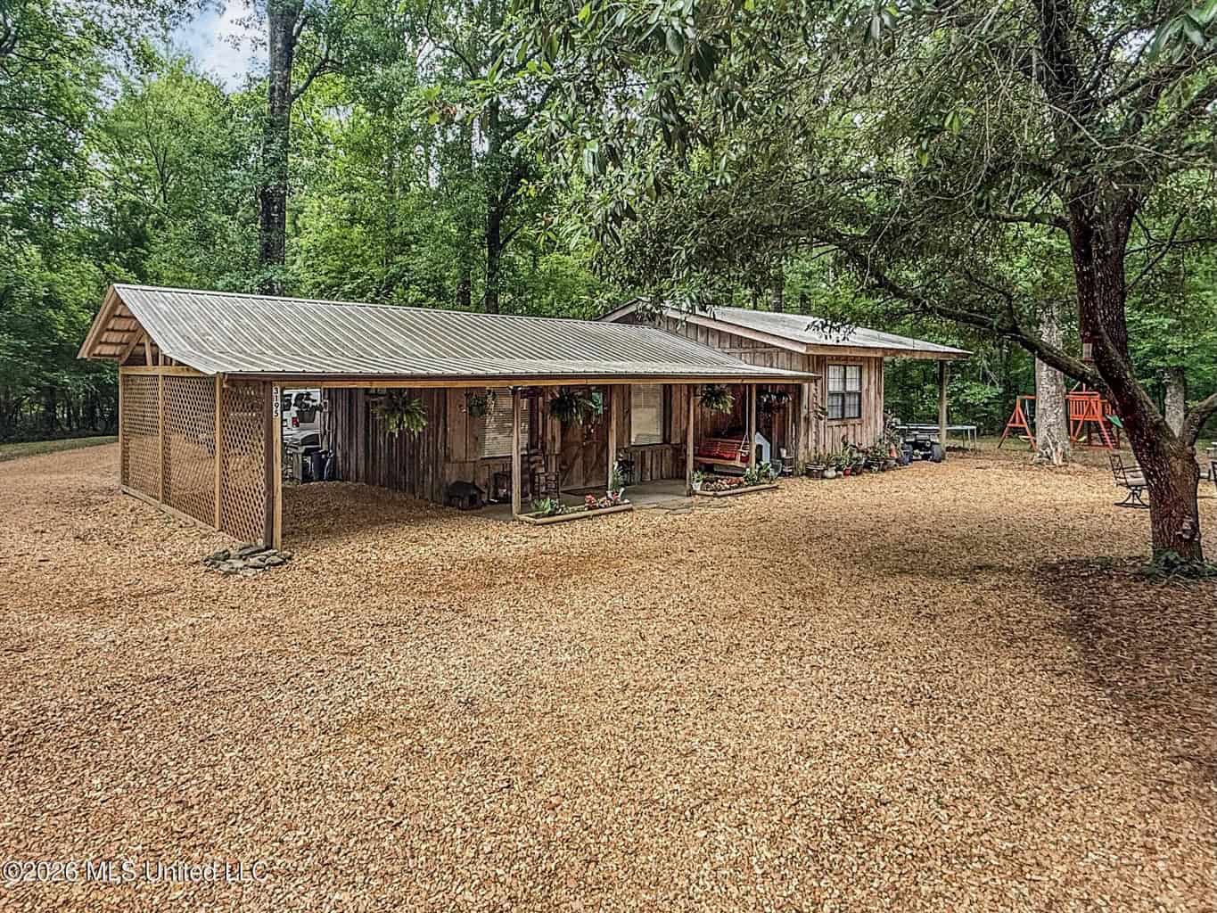 23 Acres of Riverfront Property with Sand Bar and Cabins