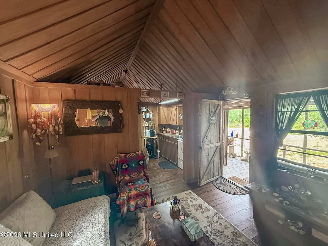 23 Acres of Riverfront Property with Sand Bar and Cabins