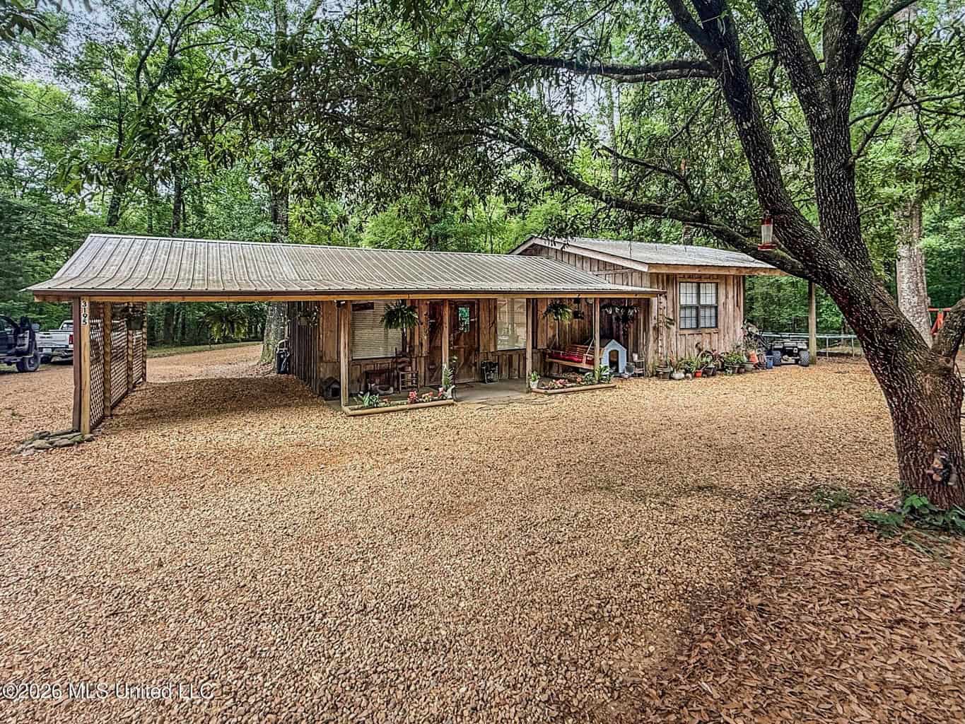 23 Acres of Riverfront Property with Sand Bar and Cabins