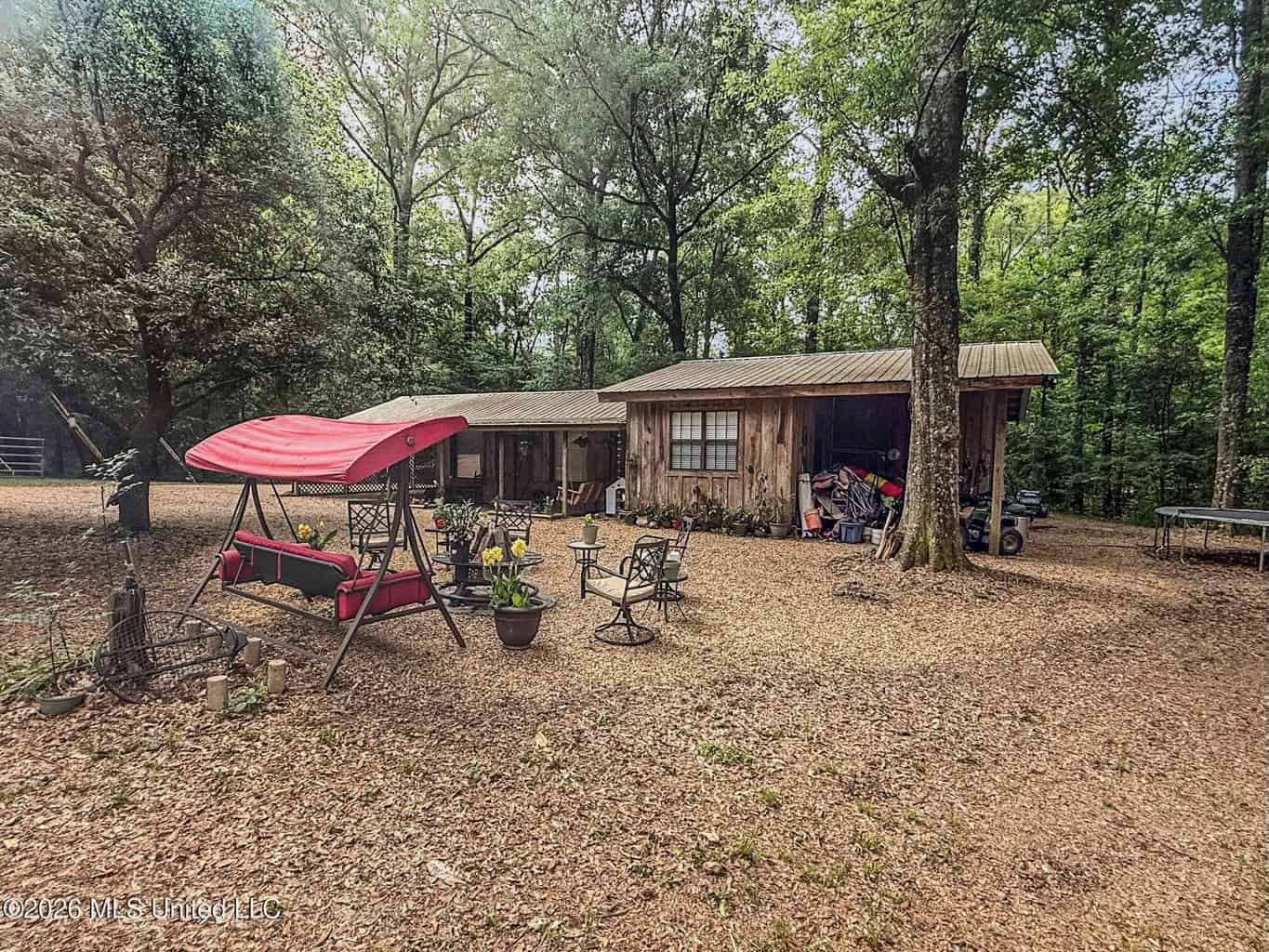 23 Acres of Riverfront Property with Sand Bar and Cabins