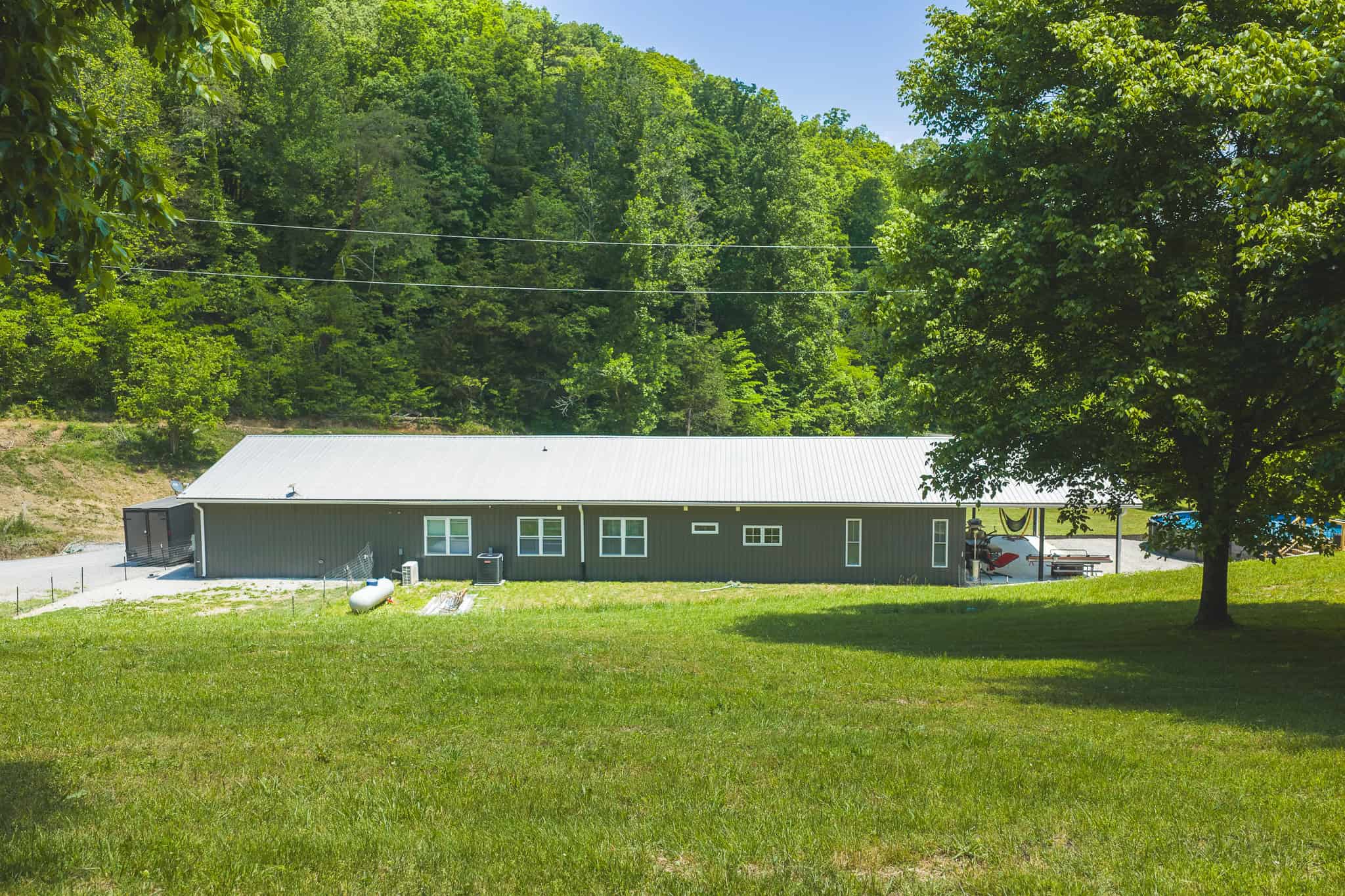 Three Bedrooms? Try Seven Rooms of Unlimited Potential. East TN-Claiborne County Hunting Lodge