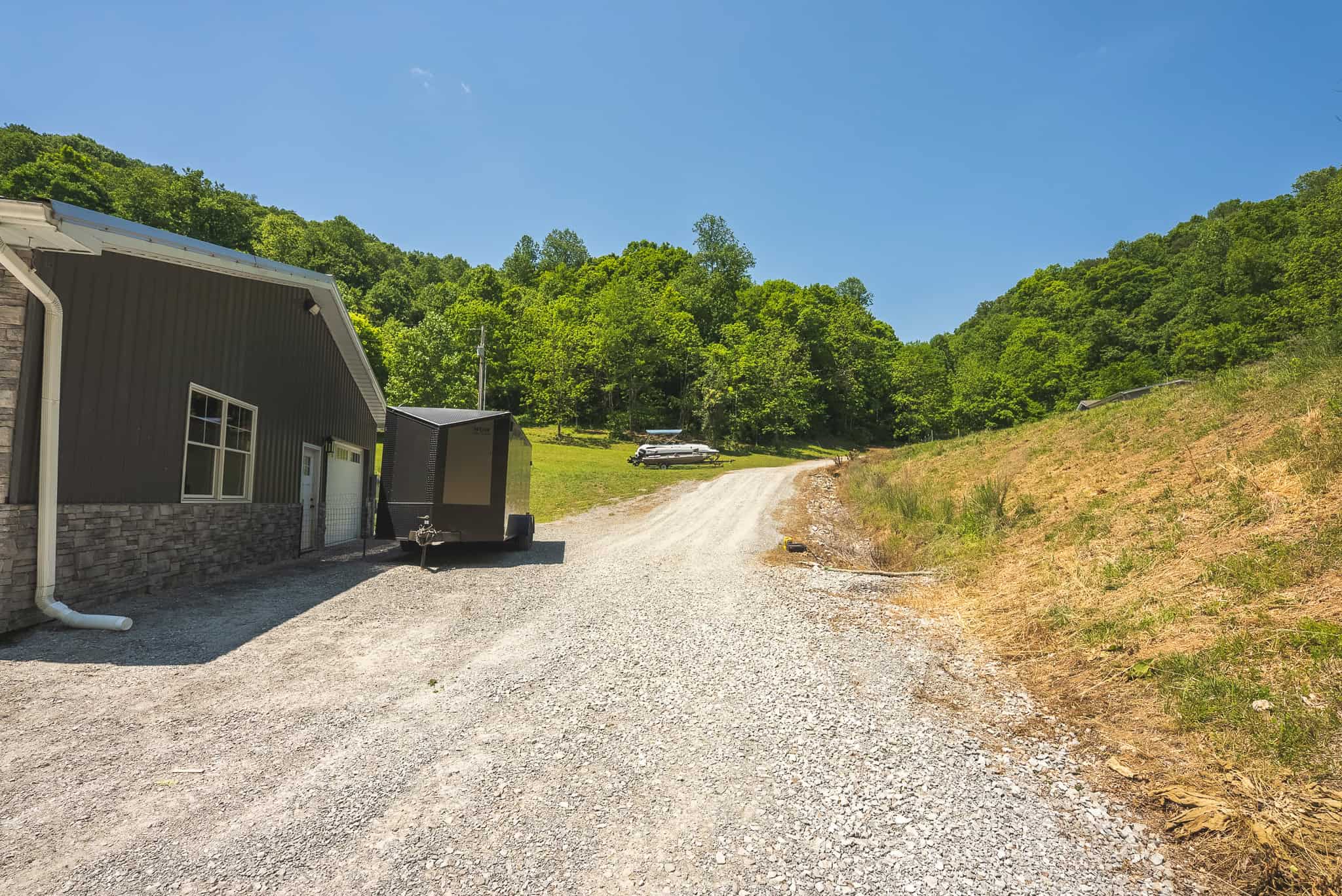 Three Bedrooms? Try Seven Rooms of Unlimited Potential. East TN-Claiborne County Hunting Lodge