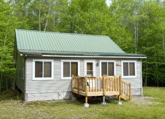 46 Acres of Maine Wilderness with Turnkey Off-Grid Cabin & Garage